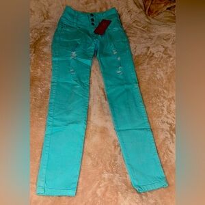 Teal Obsession High Waisted Skinny Jeans with rips Women’s size 5